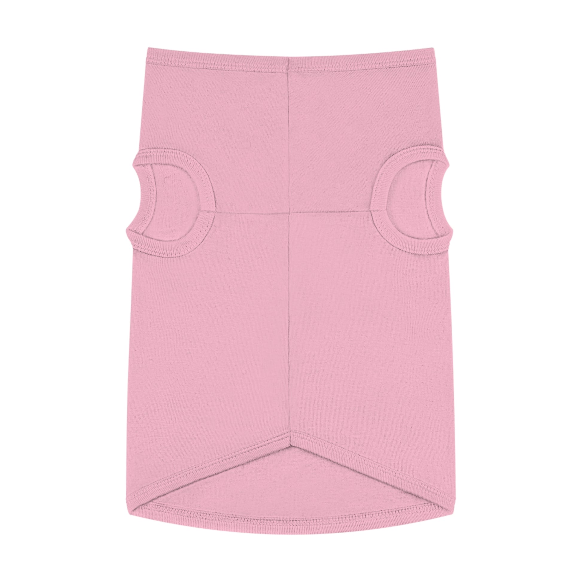 A flat lay image of a dog shirt in a light pink color. The shirt has two circular cutouts for the dog's front legs and a longer back section.